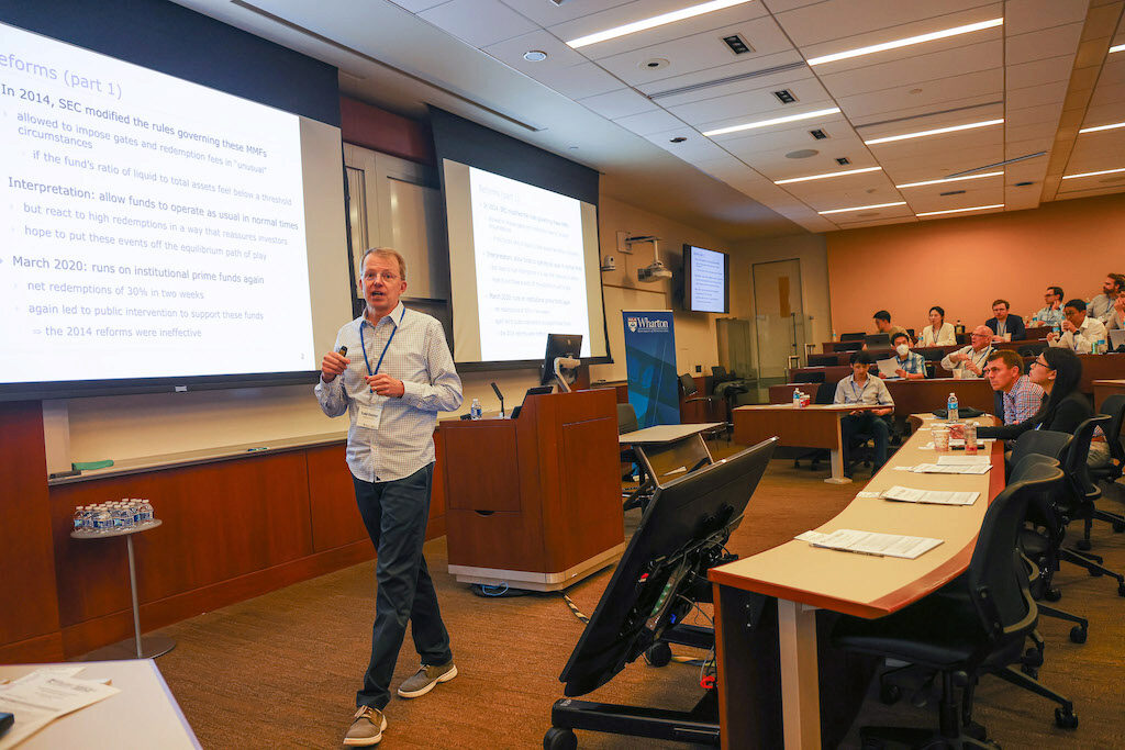 Todd Keister walks while lecturing