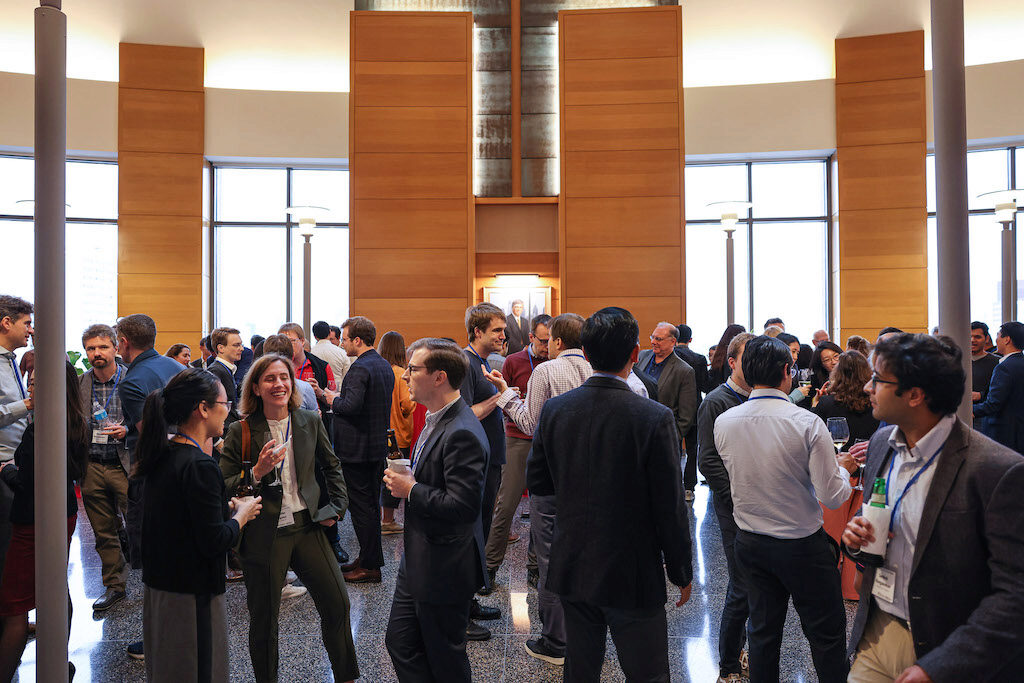 Conference attendees enjoy a reception