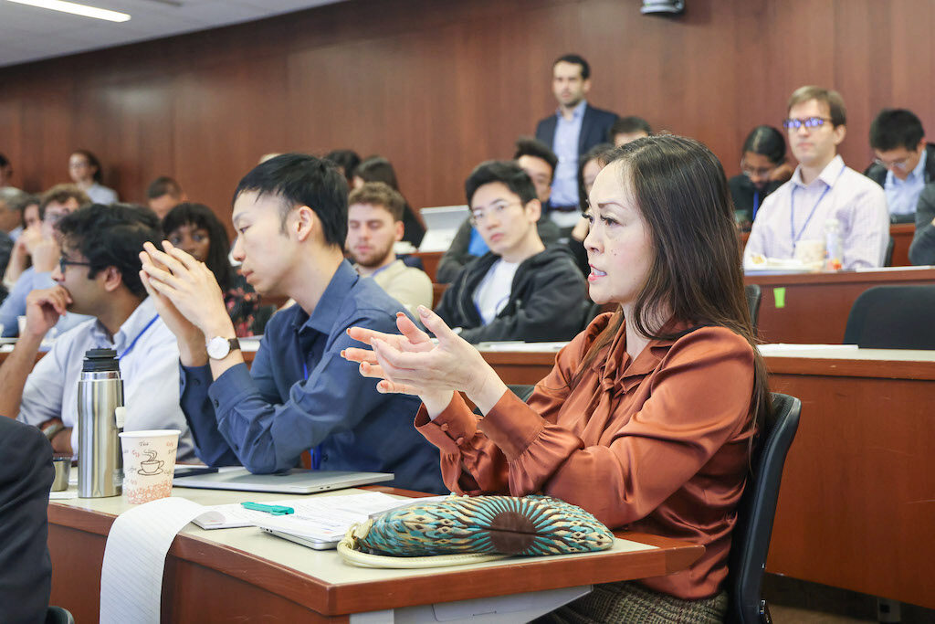 Audience members engage in discussion during the conference