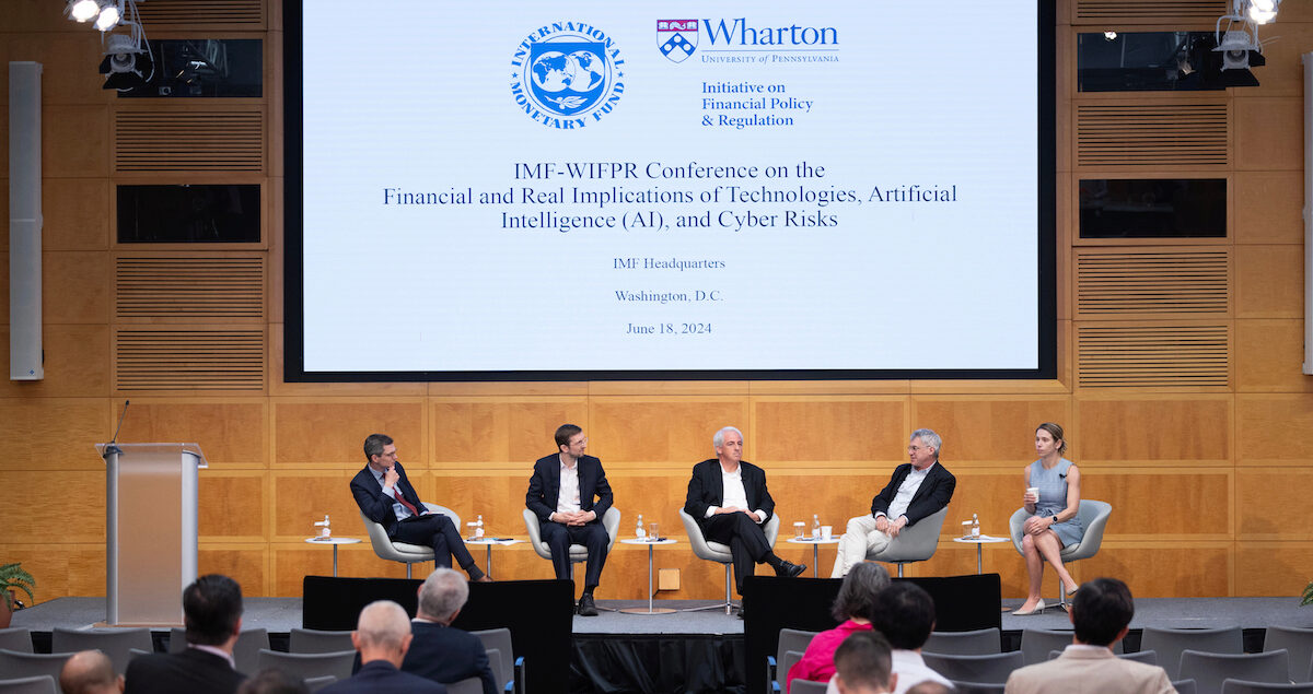 New Technologies and Artificial Intelligence: Landscape, Challenges, and Outlook Headline panel on research, “New Technologies and Artificial Intelligence: Landscape, Challenges, and Outlook,” sits on a stage.