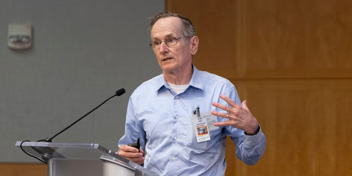 Albert Pete Kyle Albert "Pete" Kyle in discussion at the IMF-WIFPR Conference.